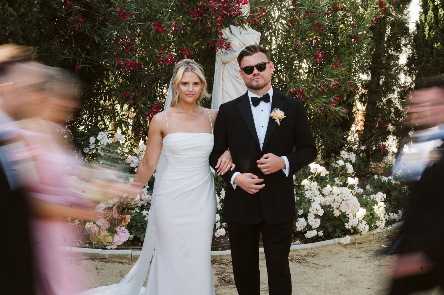 Bride and groom walking together on their wedding day in Spain