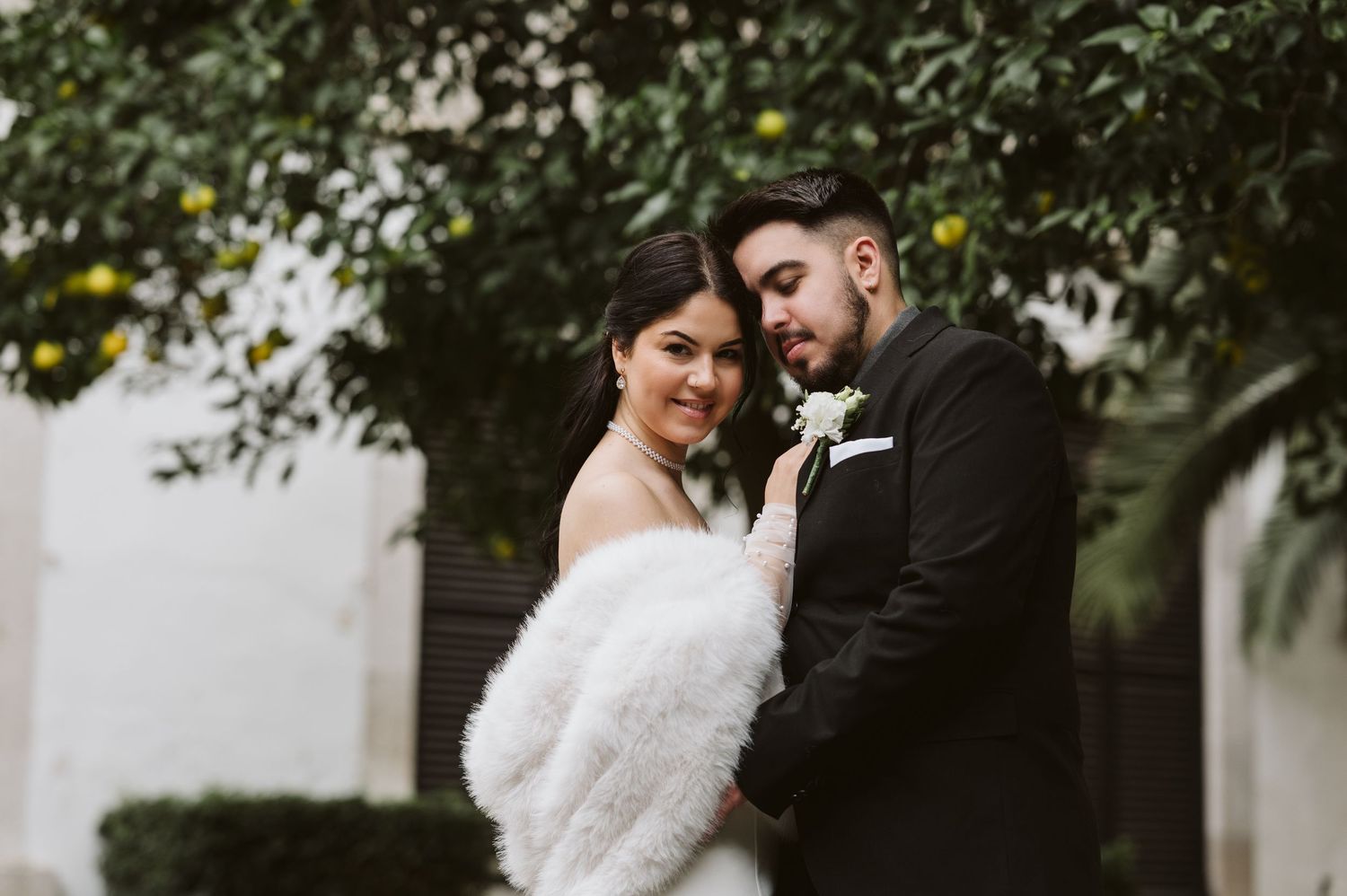 Bride and groom in a very romantic photo at Gibraltar Library
