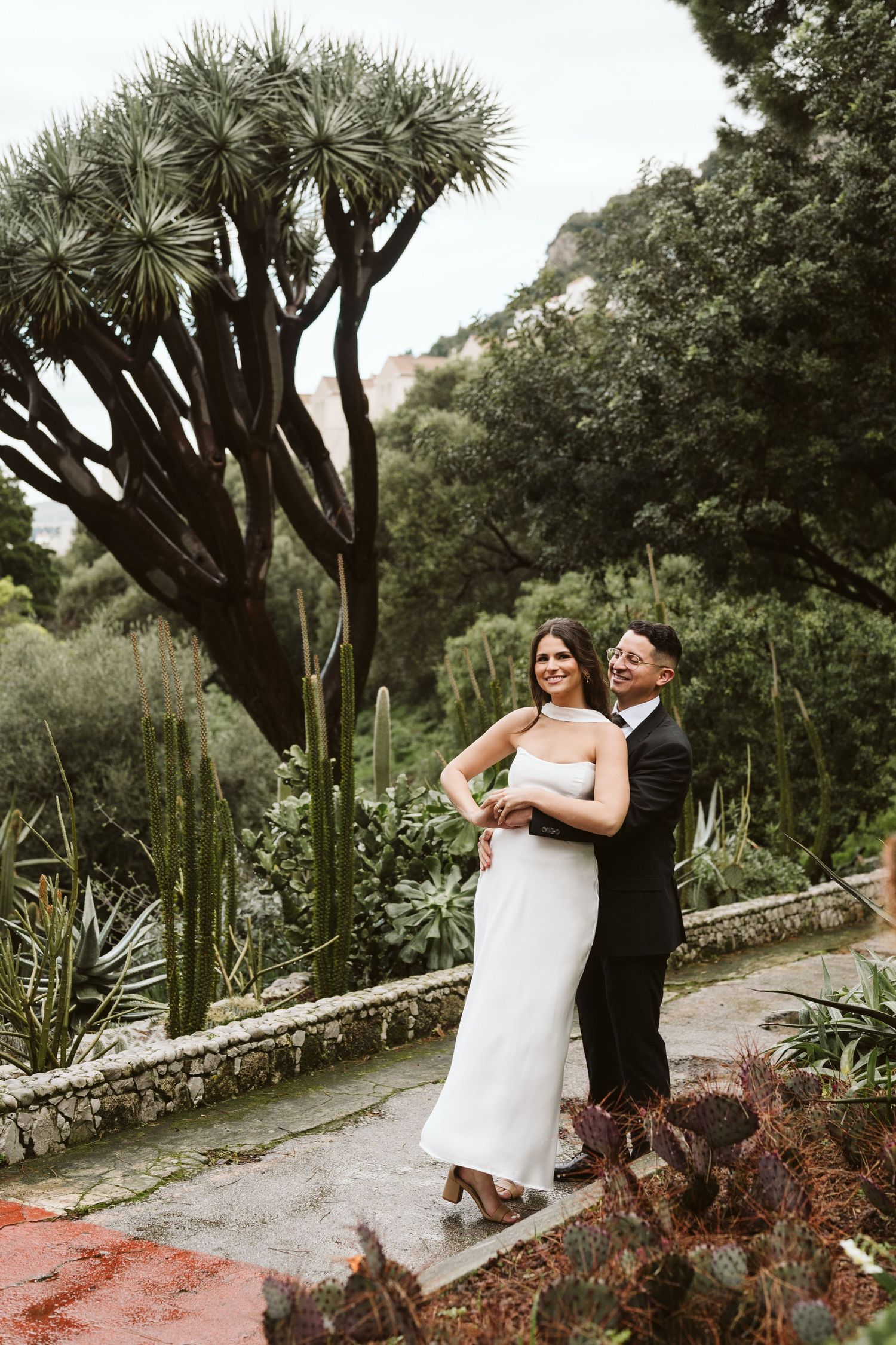 Bride and groom holding smiling at the Alameda Gardens