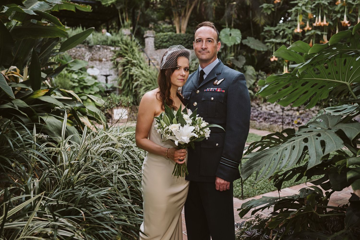 bride and groom posing for a classic photo at the Dell