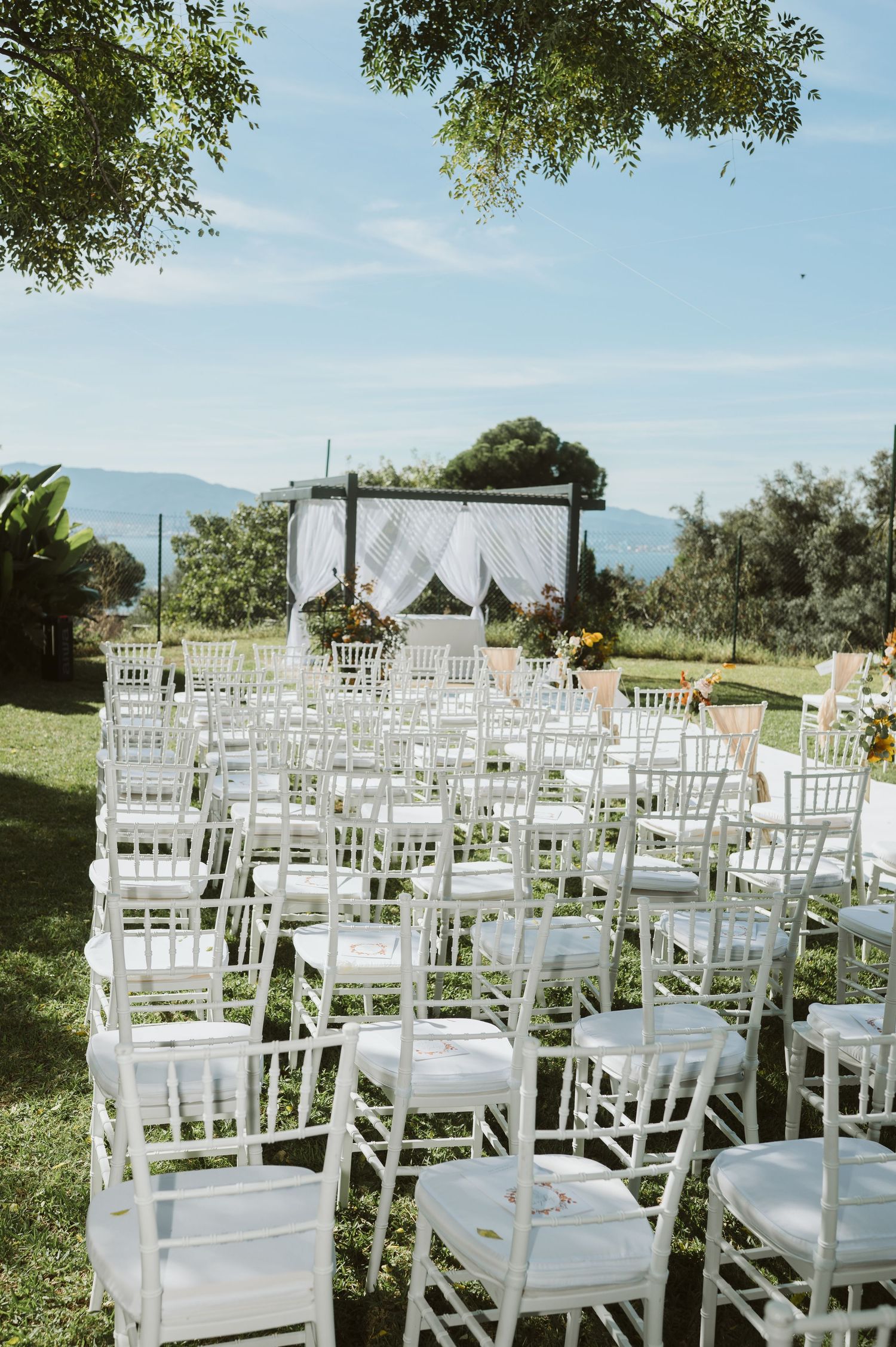 Garden-style ceremony decor at Rock Hotel near Alameda Gardens