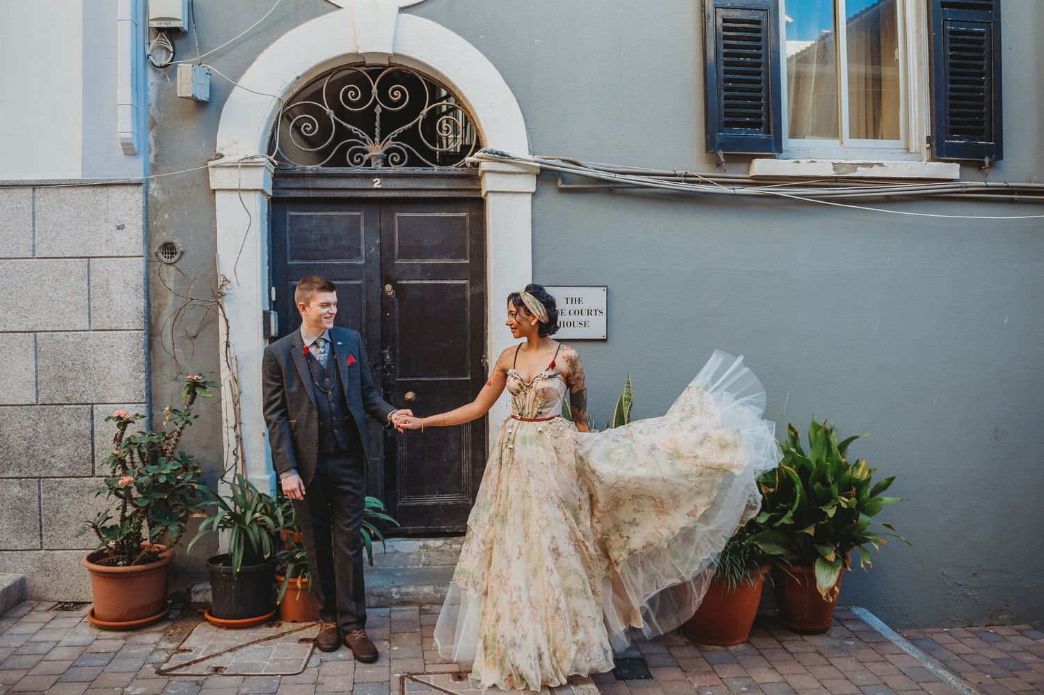 Bride and groom in a cool shot in the town area