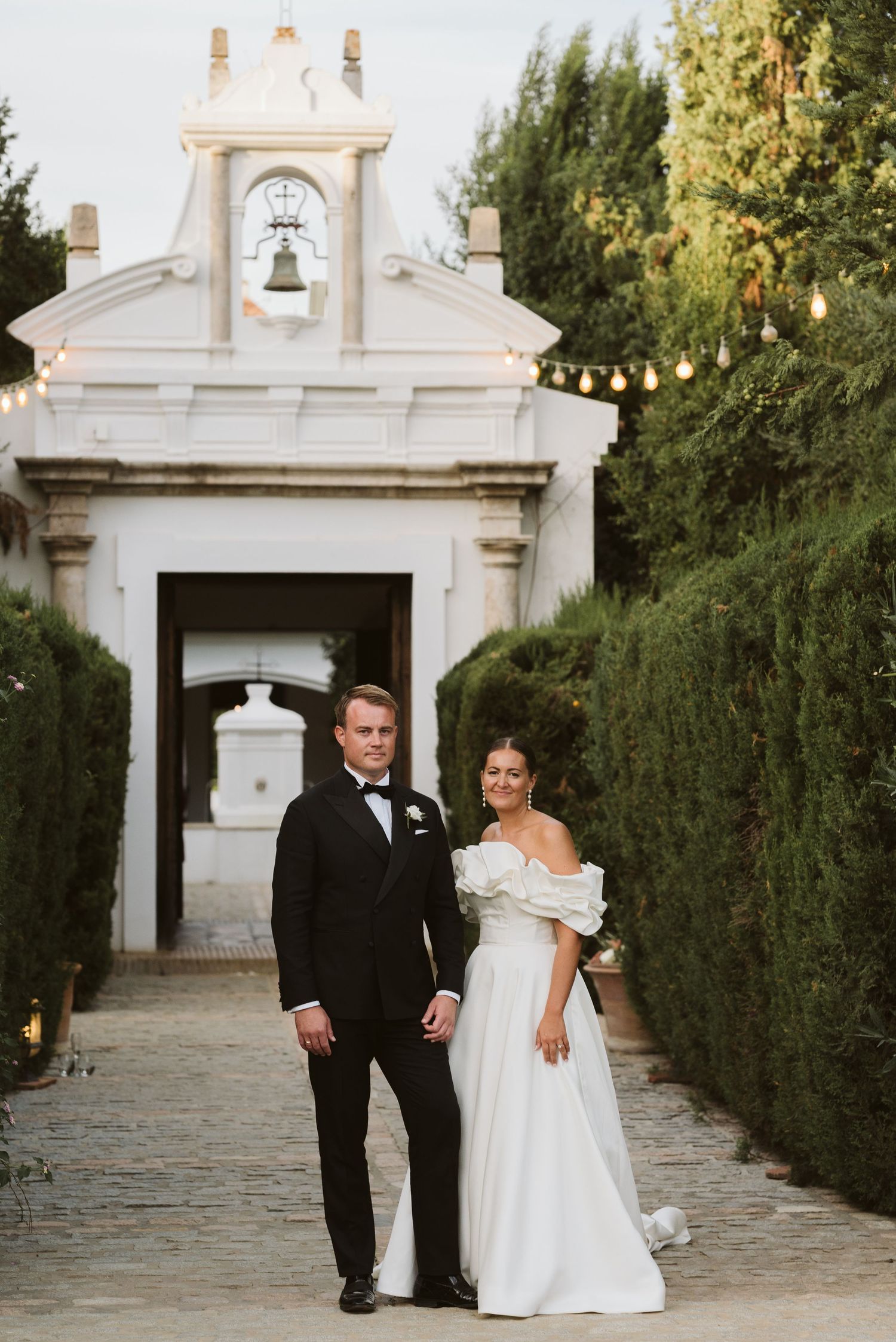 Bride and groom standing together in Finca Monasterio