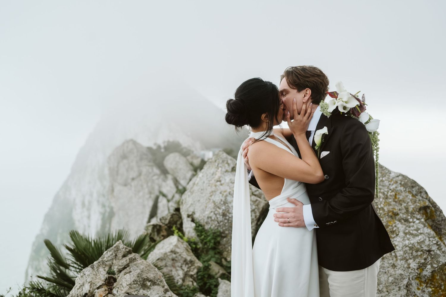 Couple kissing on Top of The Rock of Gibraltar