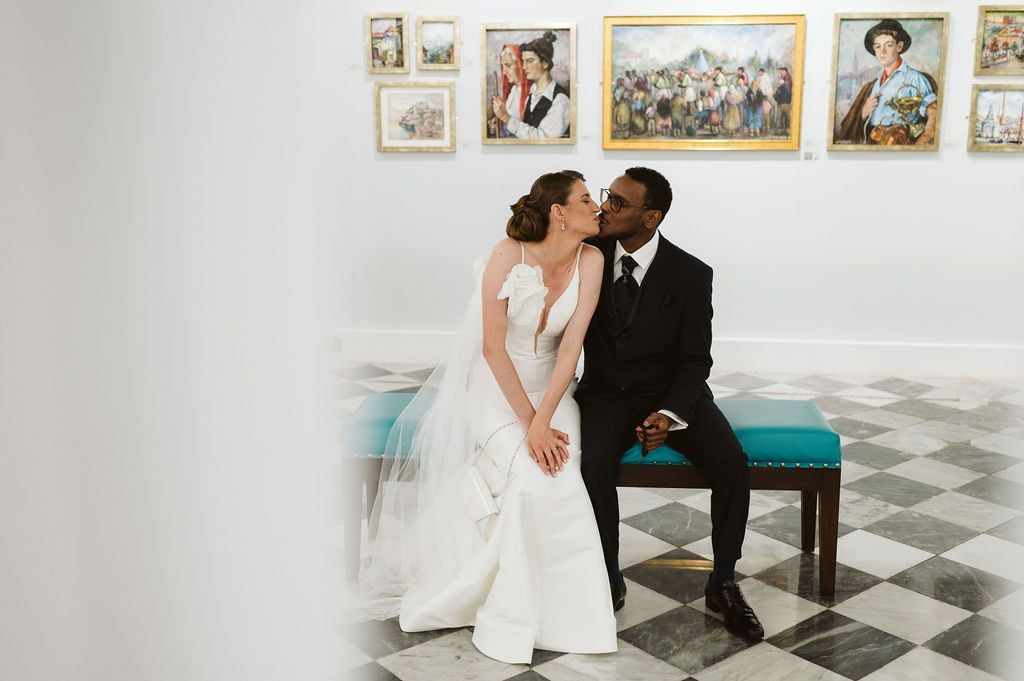 Bride and groom kissing at the Registry office
