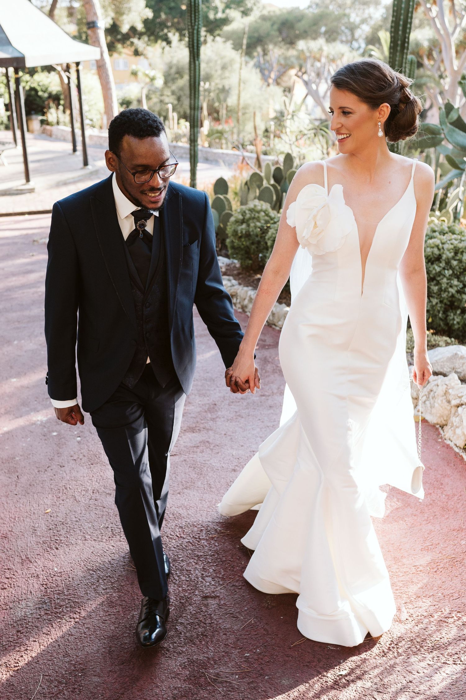 bride and groom walking in Botanical Gardens in Gibraltar