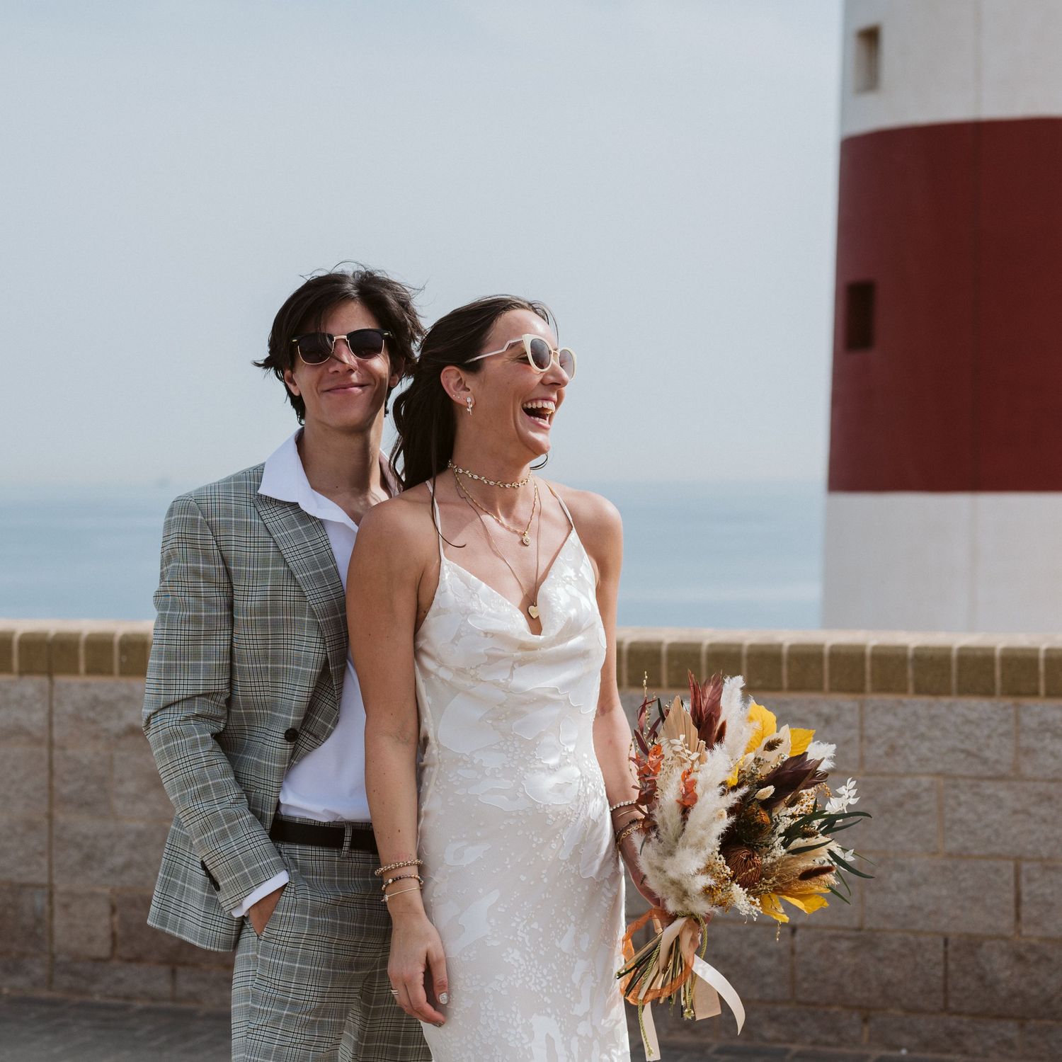Bride and groom portrait at the lighthouse