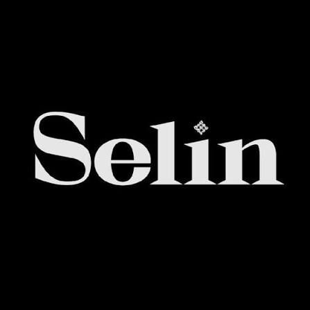 Selin brand logo in elegant white serif typography on a black background with a decorative diamond symbol.