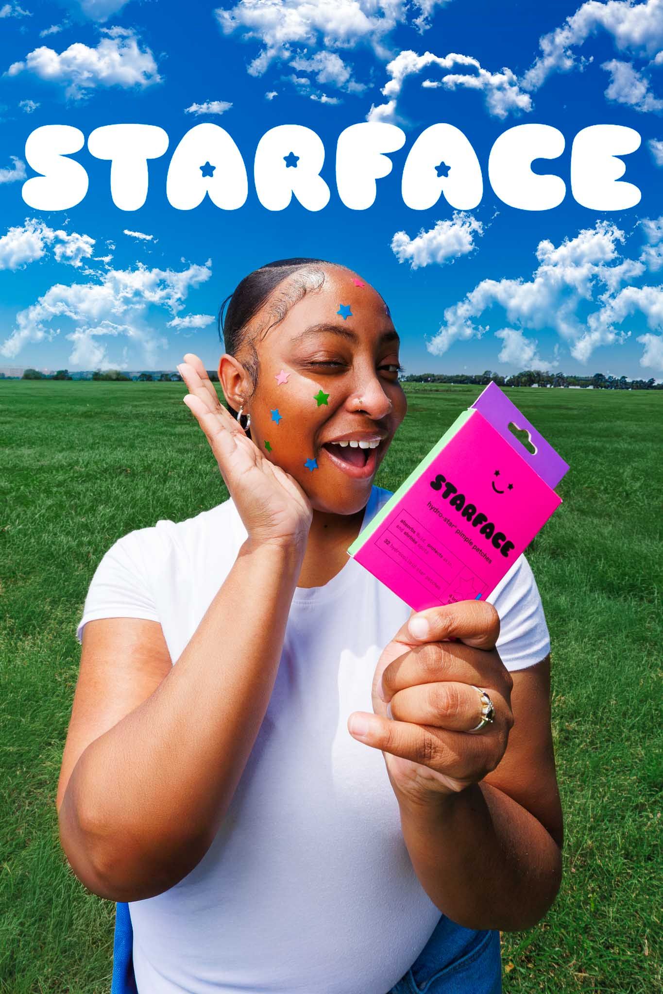 Woman smiling outdoors holding a pink Starface acne patch package with colorful star patches on her face.