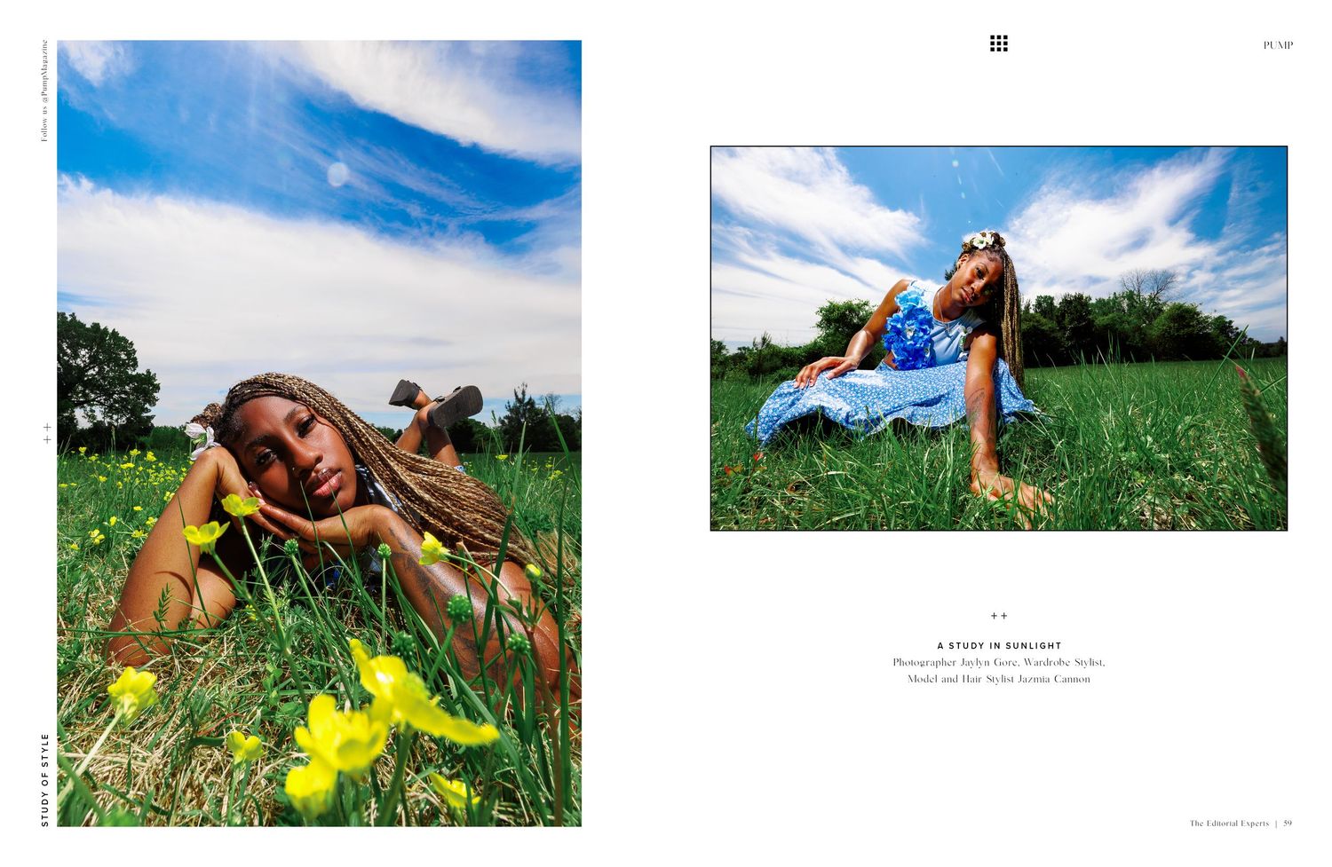 Two women with dreadlocks pose in a lush green meadow with yellow wildflowers under a dramatic cloudy sky.