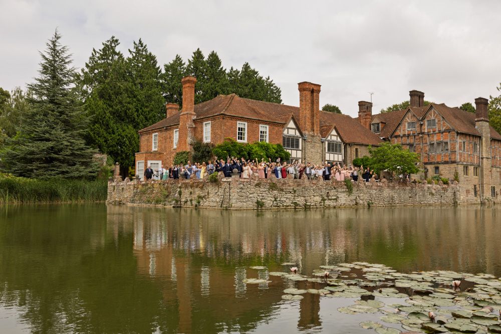 Group shot over the moat