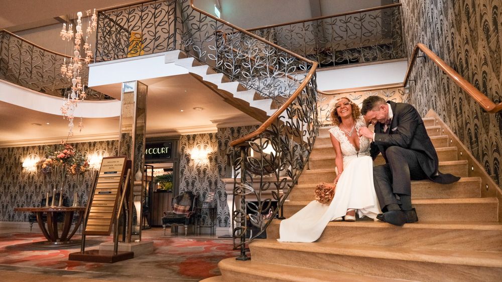 Bride and Groom on the stairs