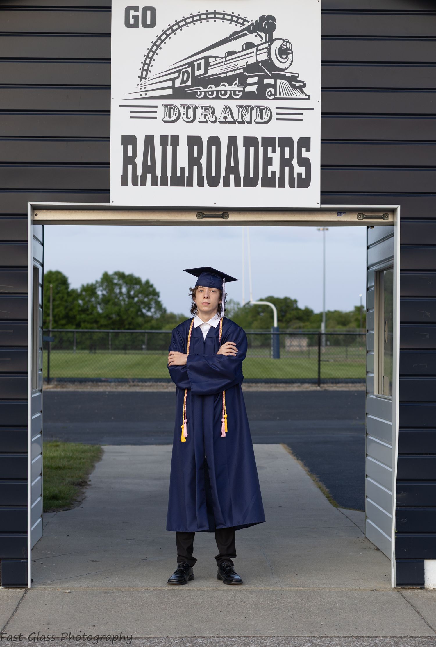 High school senior cap and gown photoshoot- Durand Roundhouse Stadium
