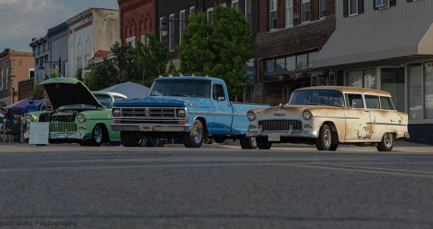 Classic vehicles parked downtown Durand, MI during a carshow