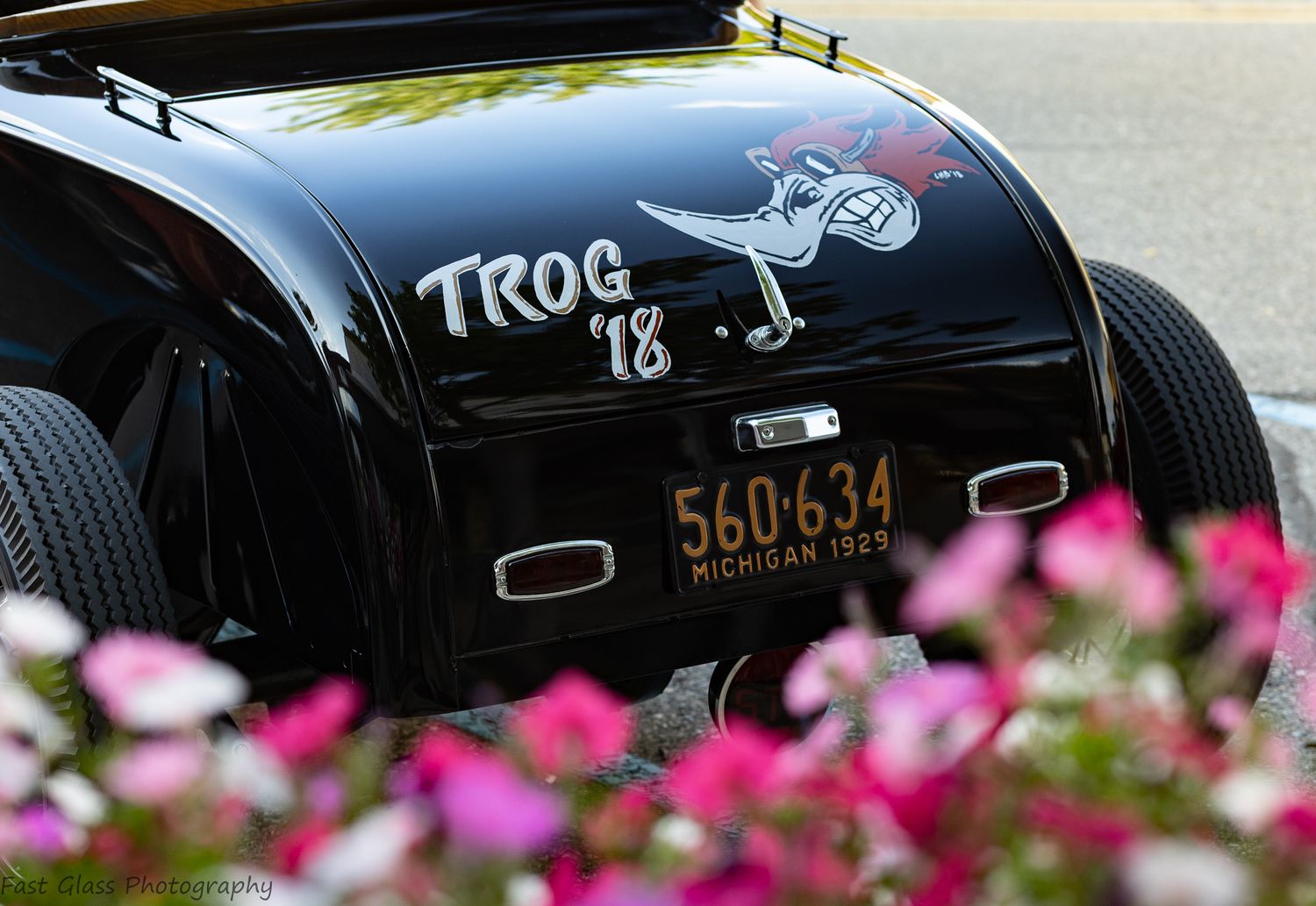 Beautiful flowers and sweet street rod
