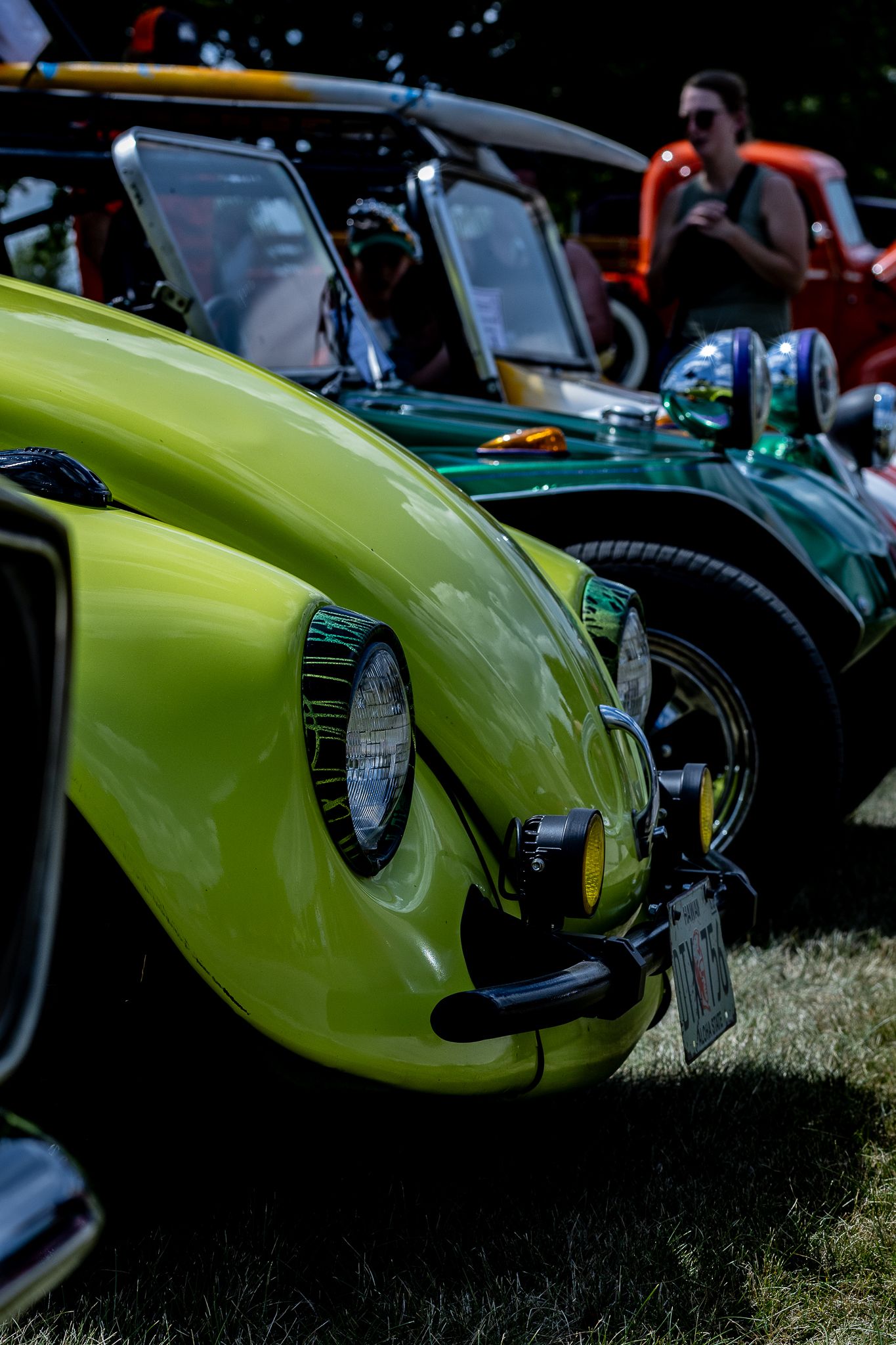Vintage Volkswagen Beetle with a Manx Buggy in the background