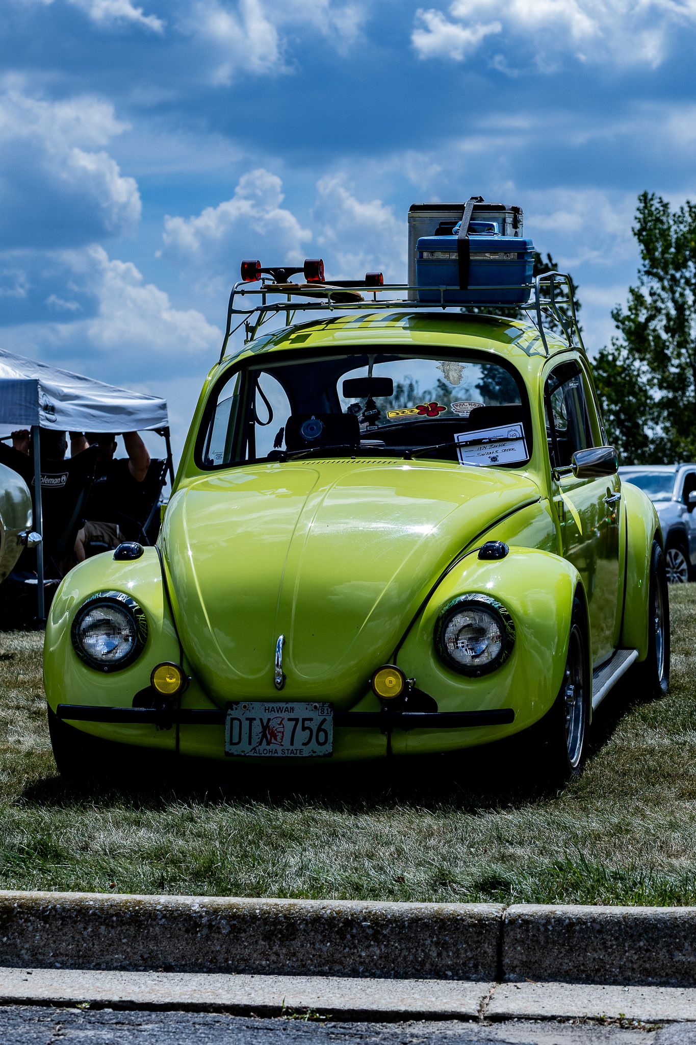 Vintage Volkswagen Beetle and dramatic, beautiful blue skies.