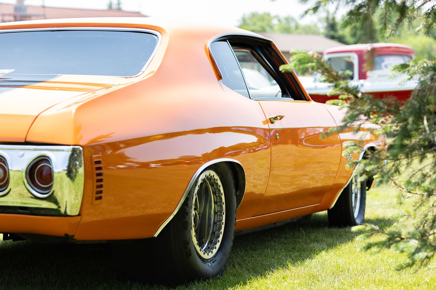 Beautiful orange Chevelle with huge rear tires