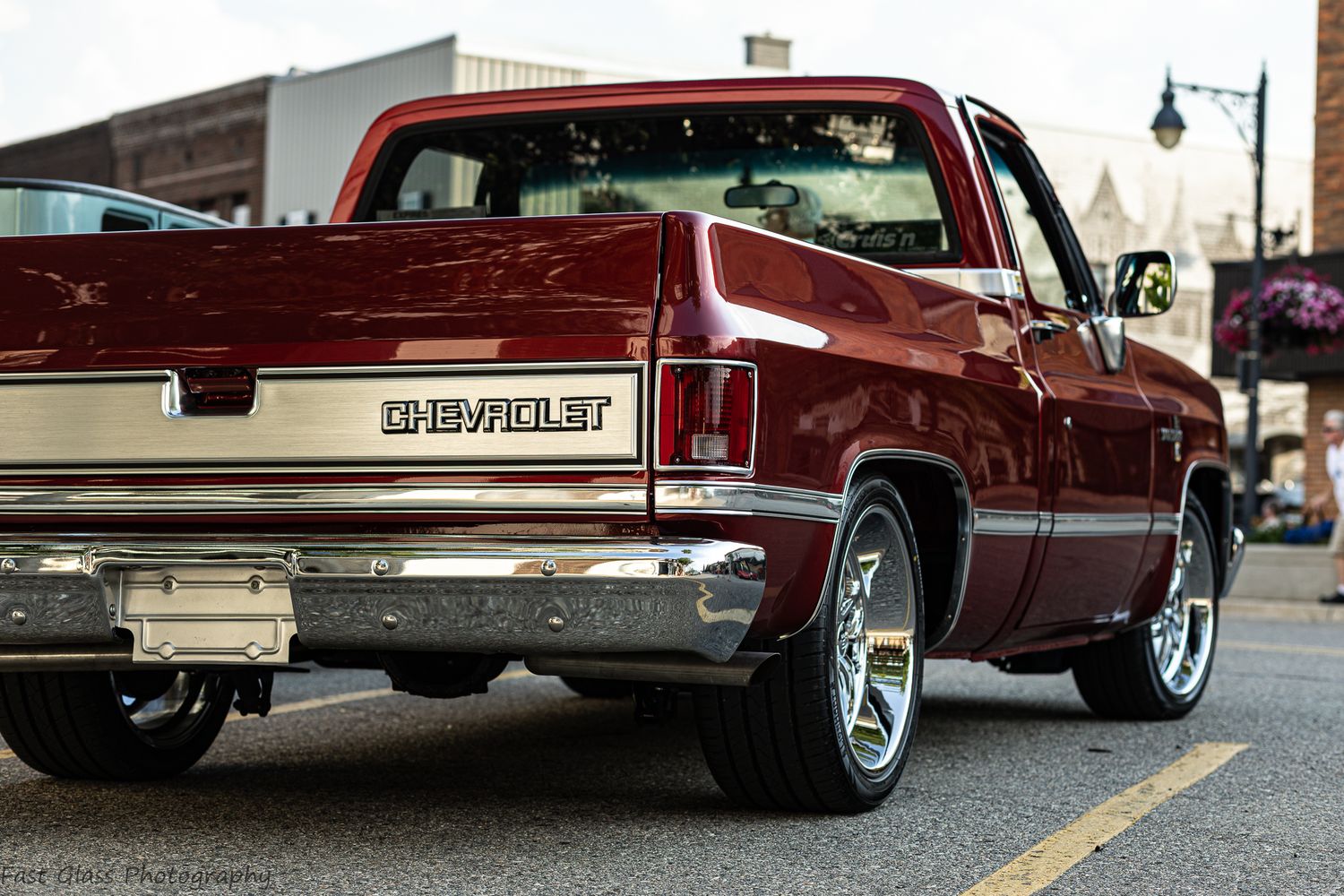 Chevy square body pickup truck with a beautiful red paint job.
