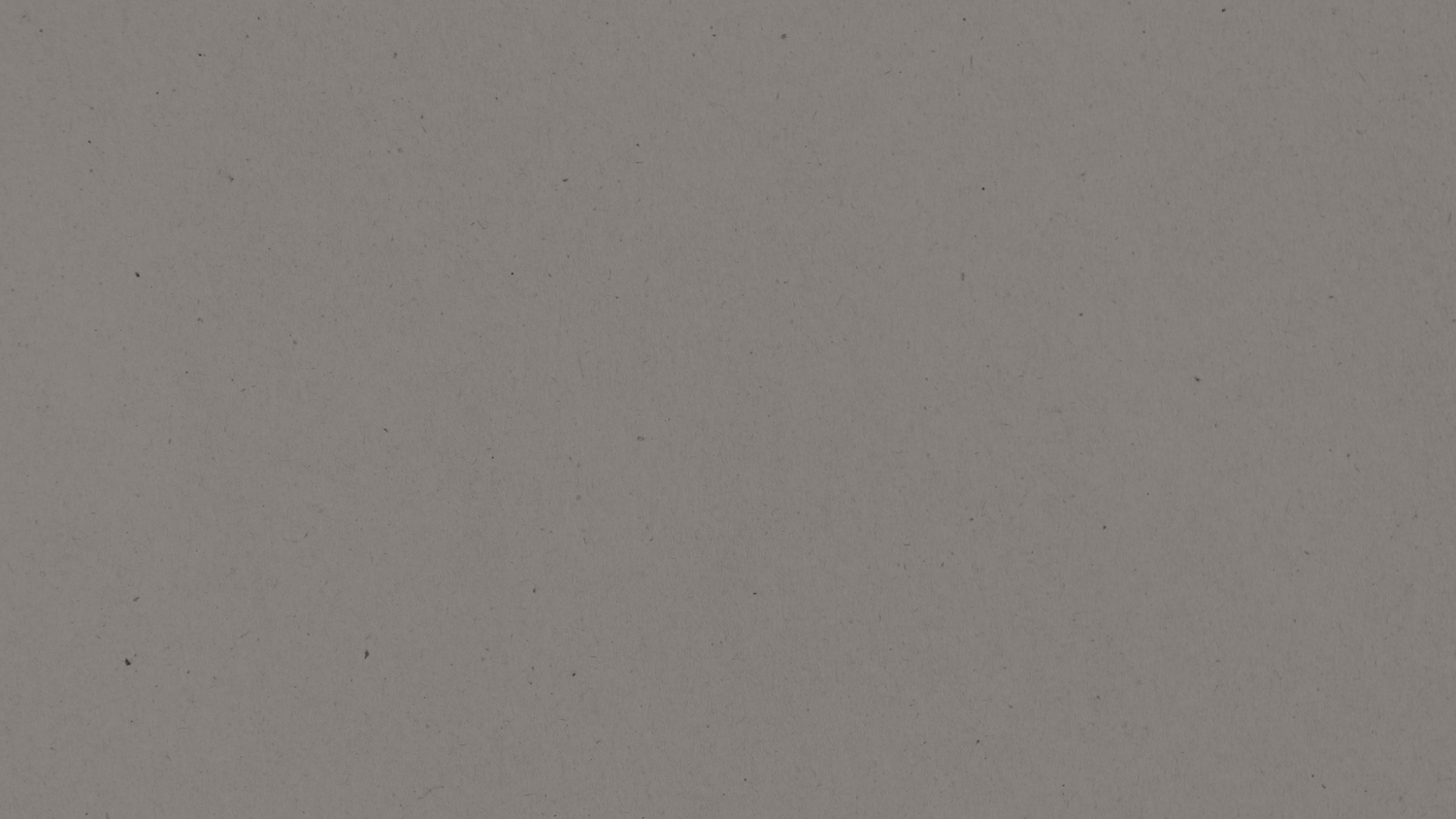 Solid gray textured background with a smooth matte finish, ideal for minimalist design projects.