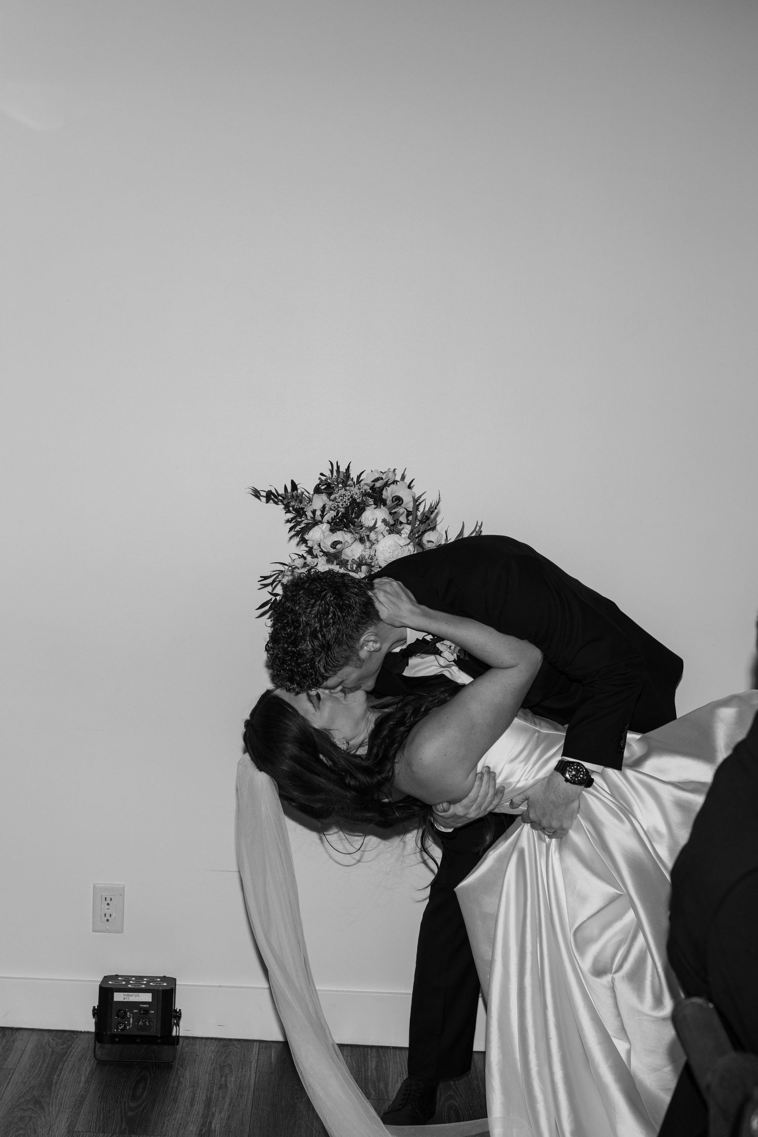 Artistic black and white sequence of two dancers performing an intimate dance move.