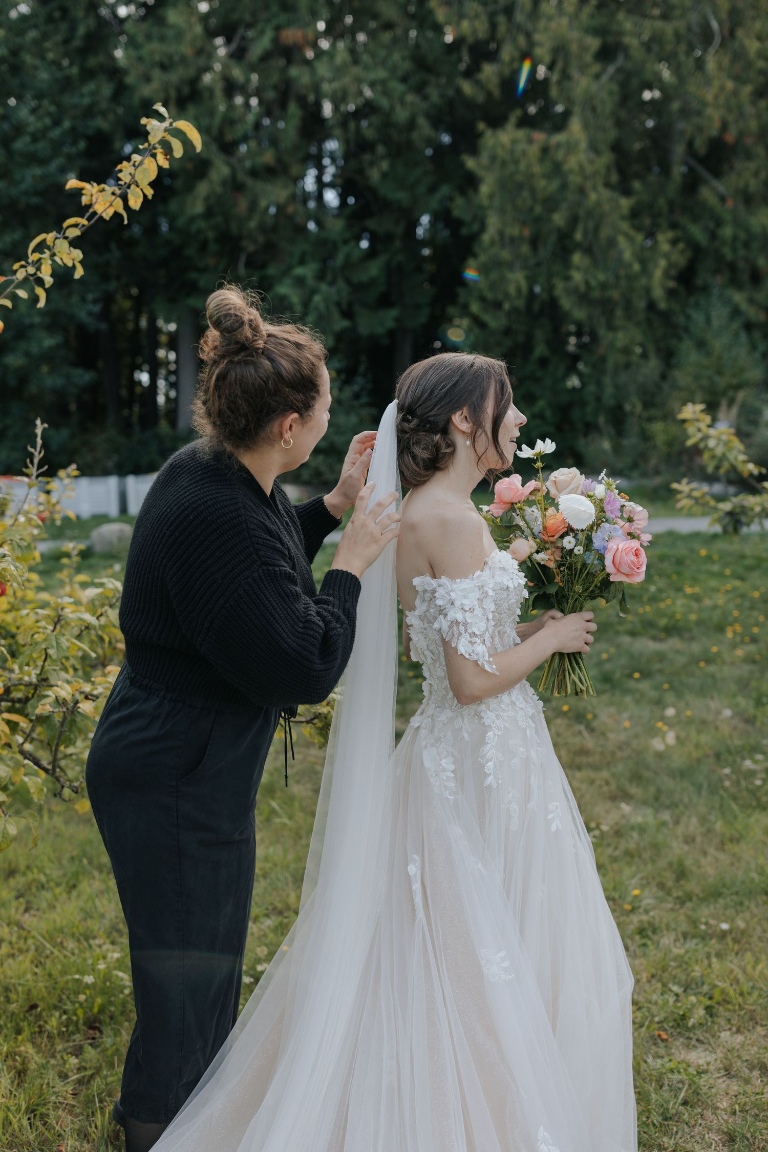 Wedding preparations in an outdoor garden setting.