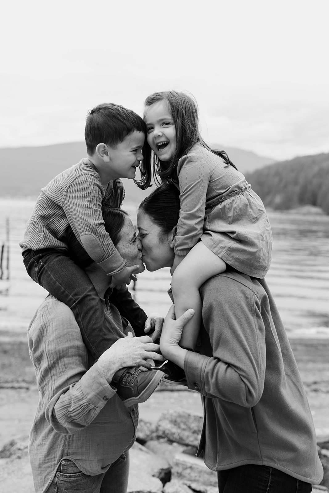 Black and white romantic couple photos showing intimate moments by the water.