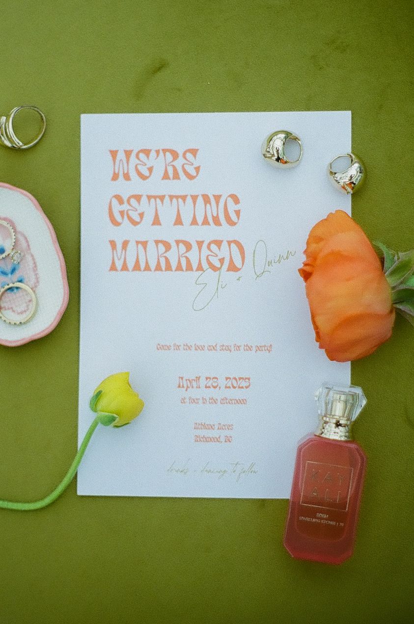 Wedding invitation suite with 'Getting Married' text and perfume bottle on green background.