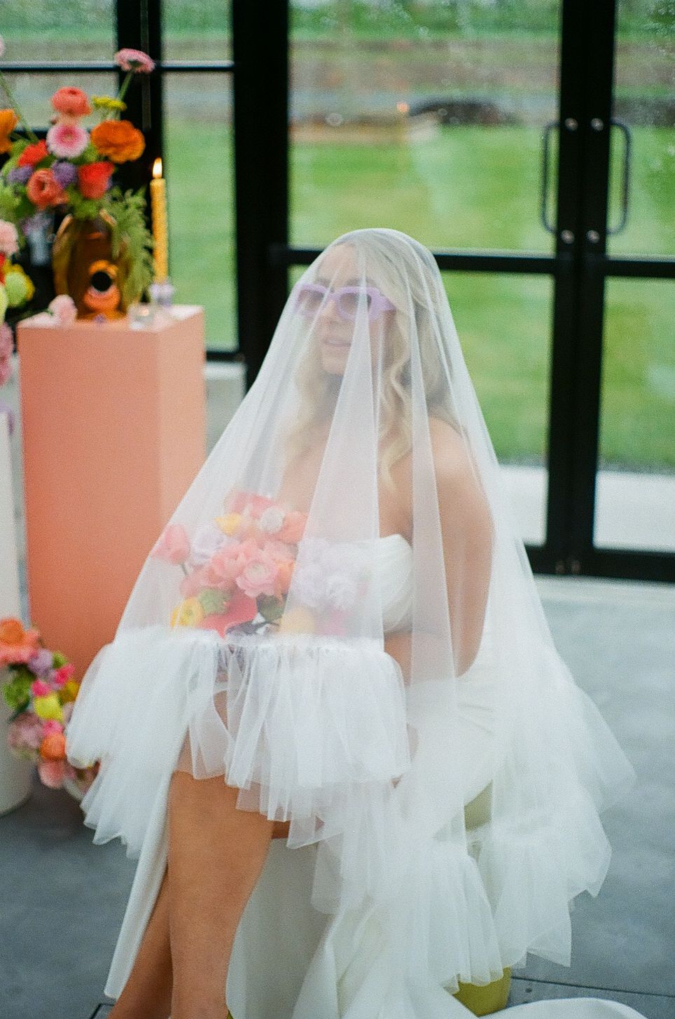 Wedding dress details showing layers of tulle and delicate veil fabric.