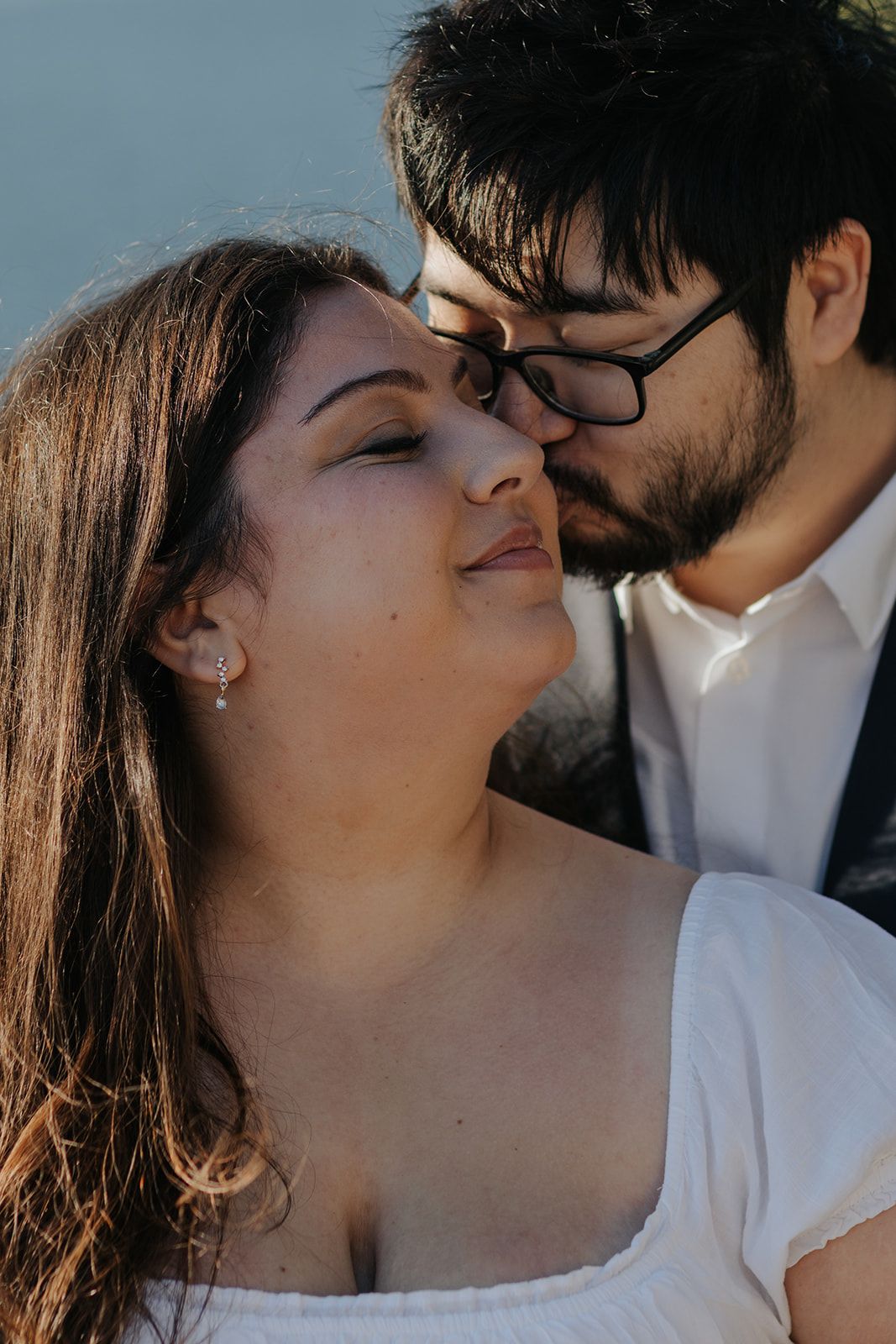 A series of intimate close-up moments captured in warm sunlight.