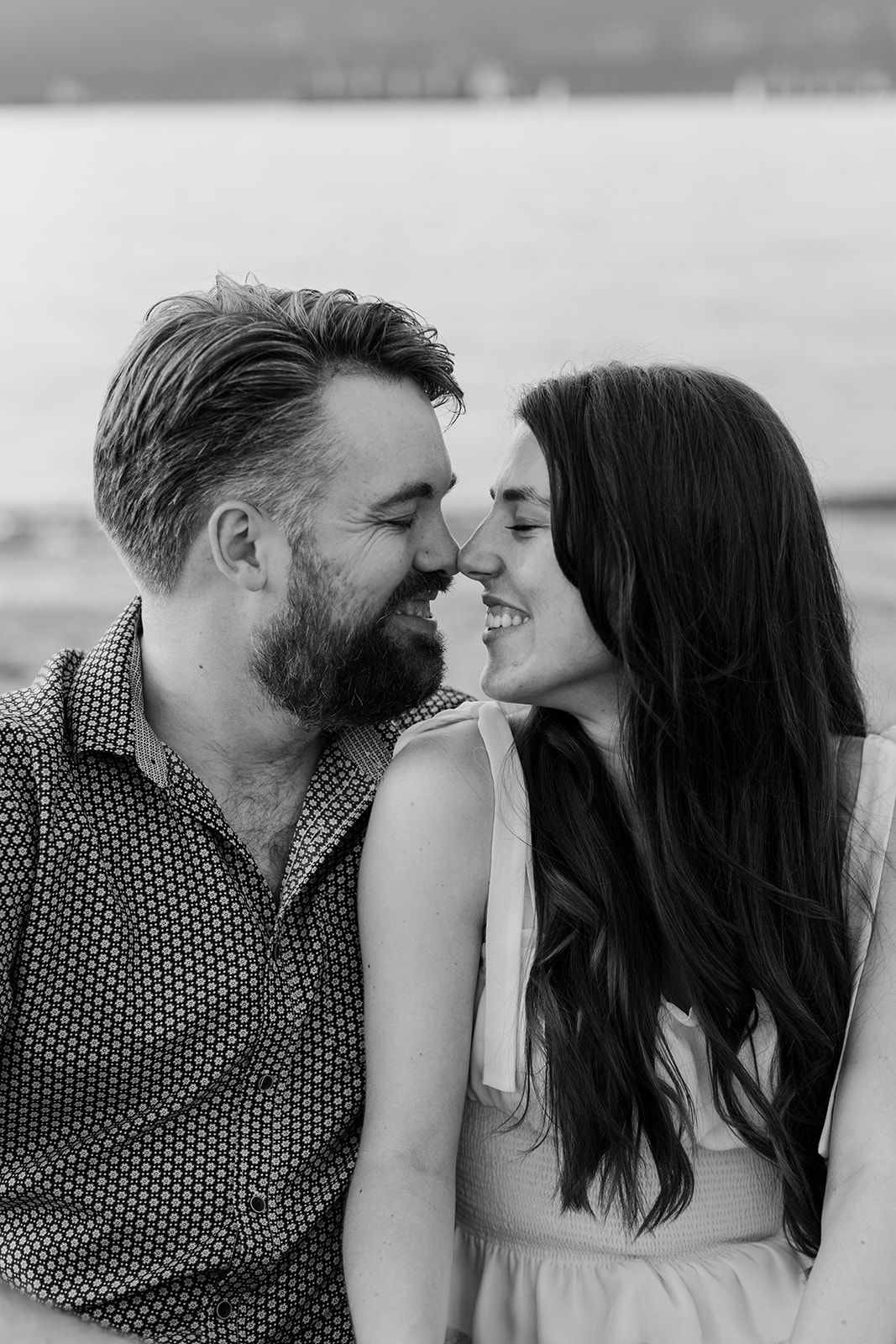 A tender black and white photo sequence of a couple sharing intimate moments.