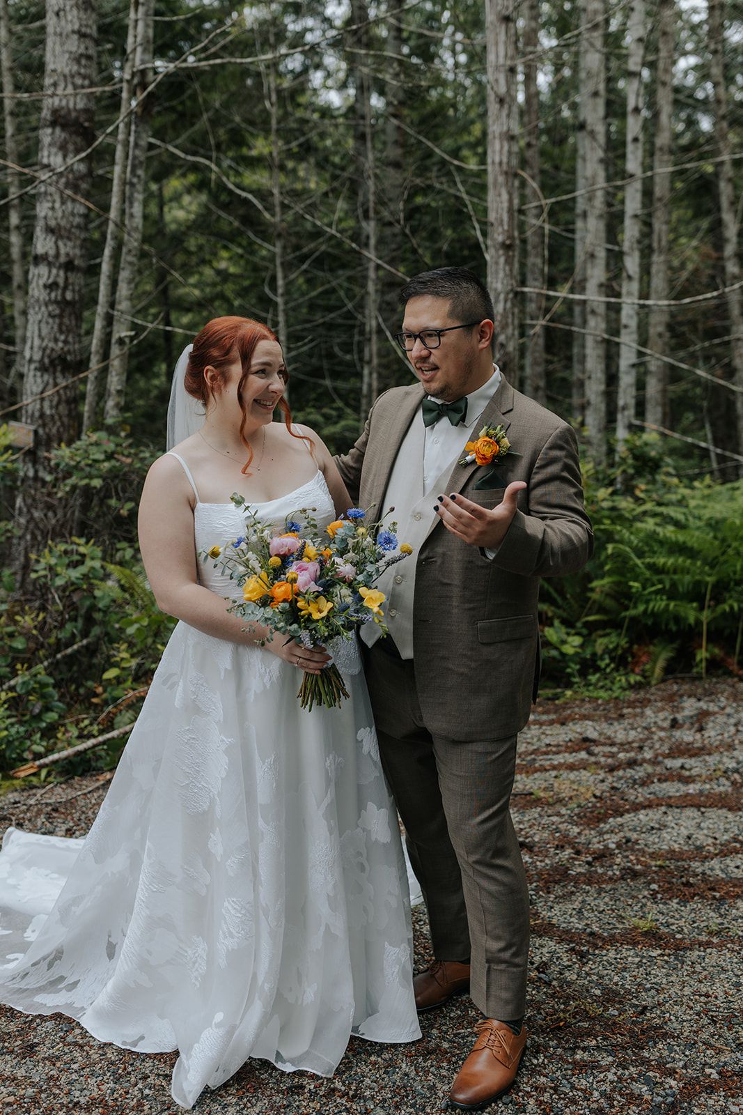 Candid wedding moments captured in a forest setting with natural lighting and evergreen trees.