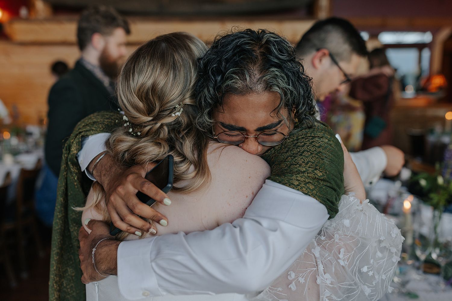 Wedding celebration moments captured in an intimate indoor venue.