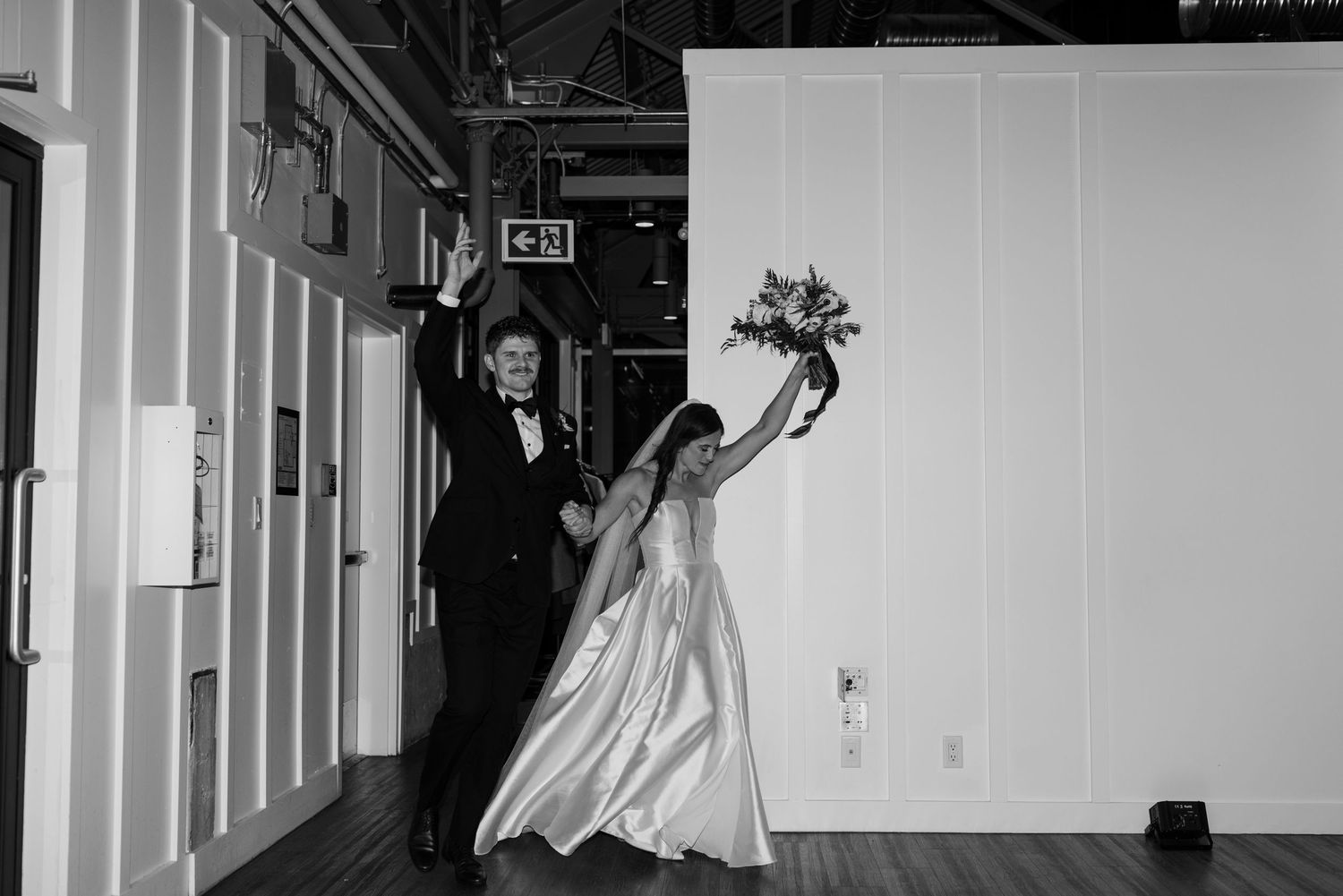 Interior hallway shots showing wedding dress silhouettes against white walls.