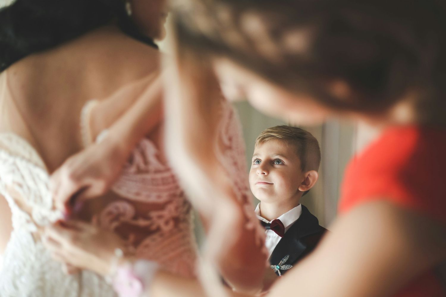 Soft focus detail shots of wedding preparations and moments.