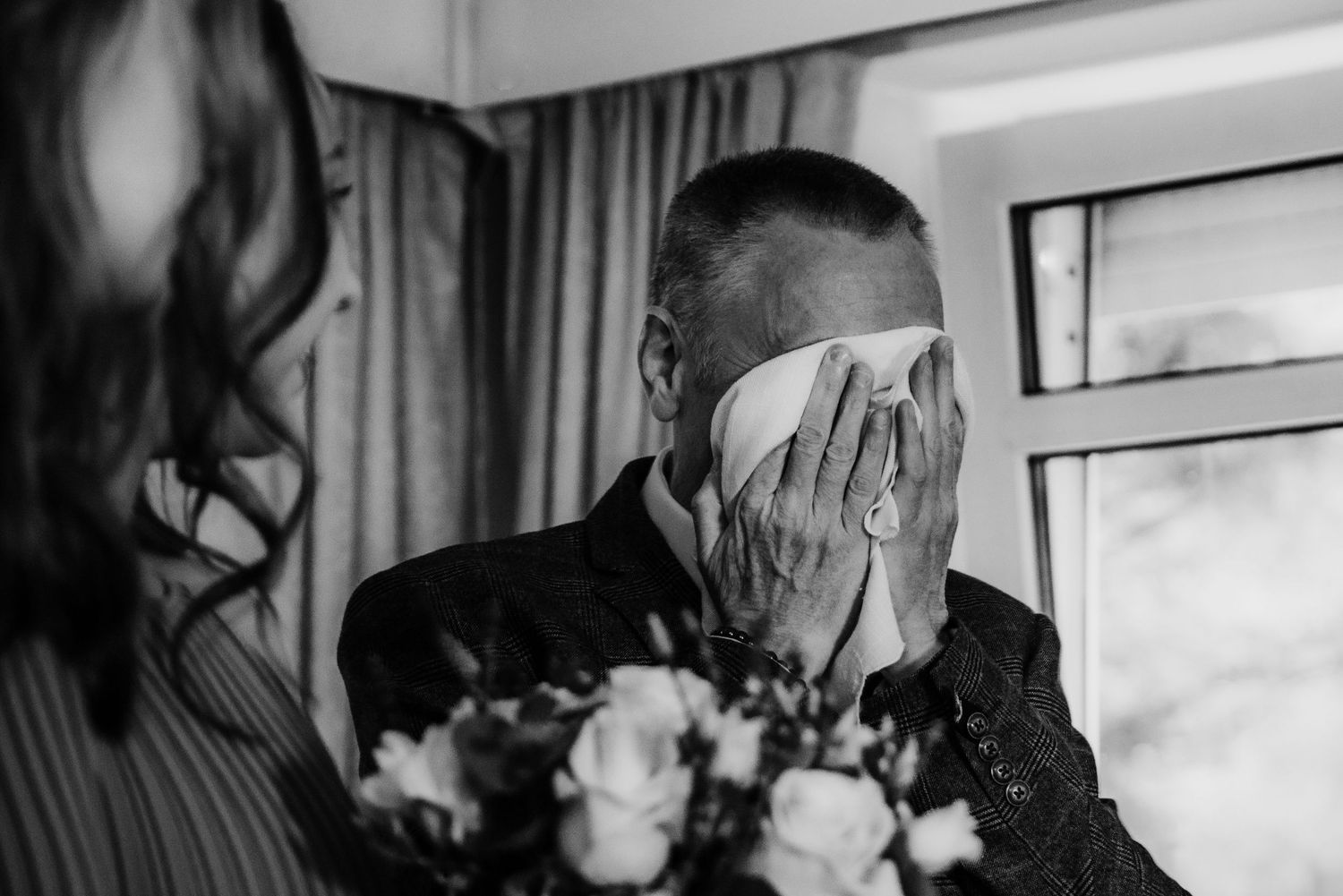 A black and white photo sequence shows two people dancing and embracing in an intimate moment.