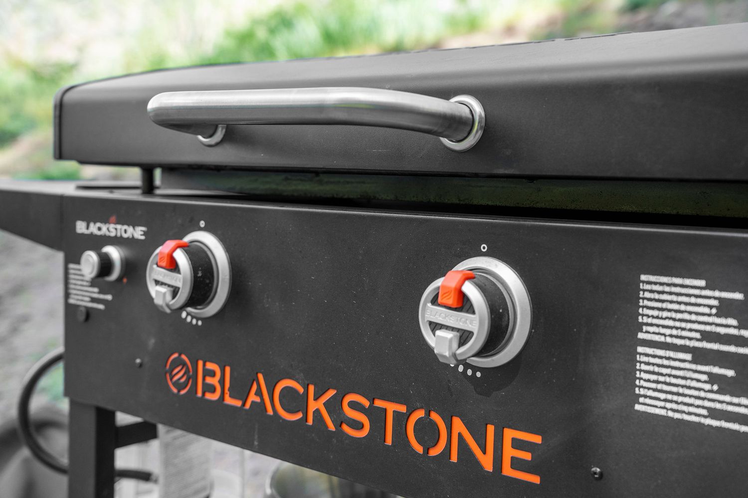 Close-up view of Blackstone grill controls and branding details.