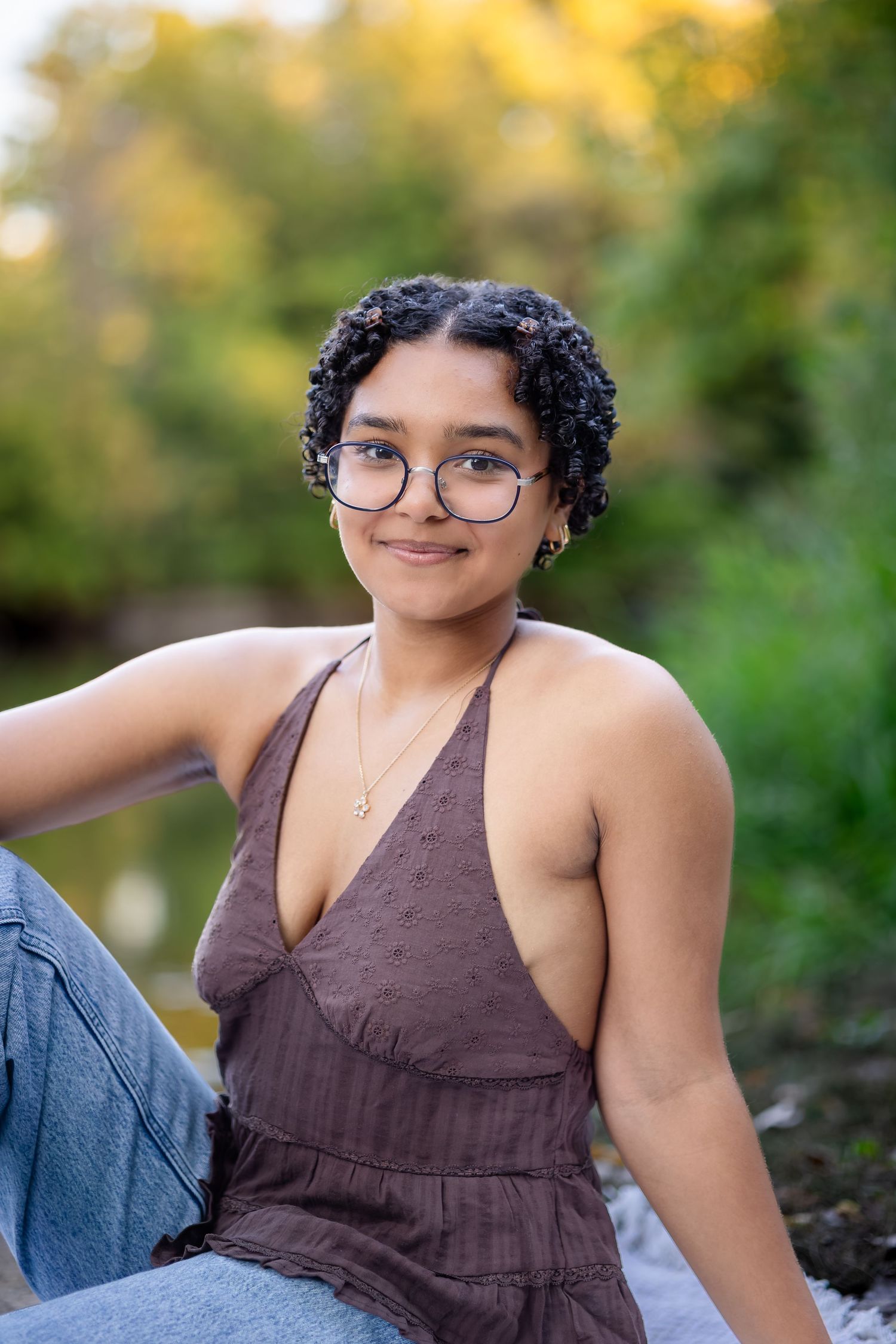Casual outdoor portraits with natural lighting and a warm autumn background.