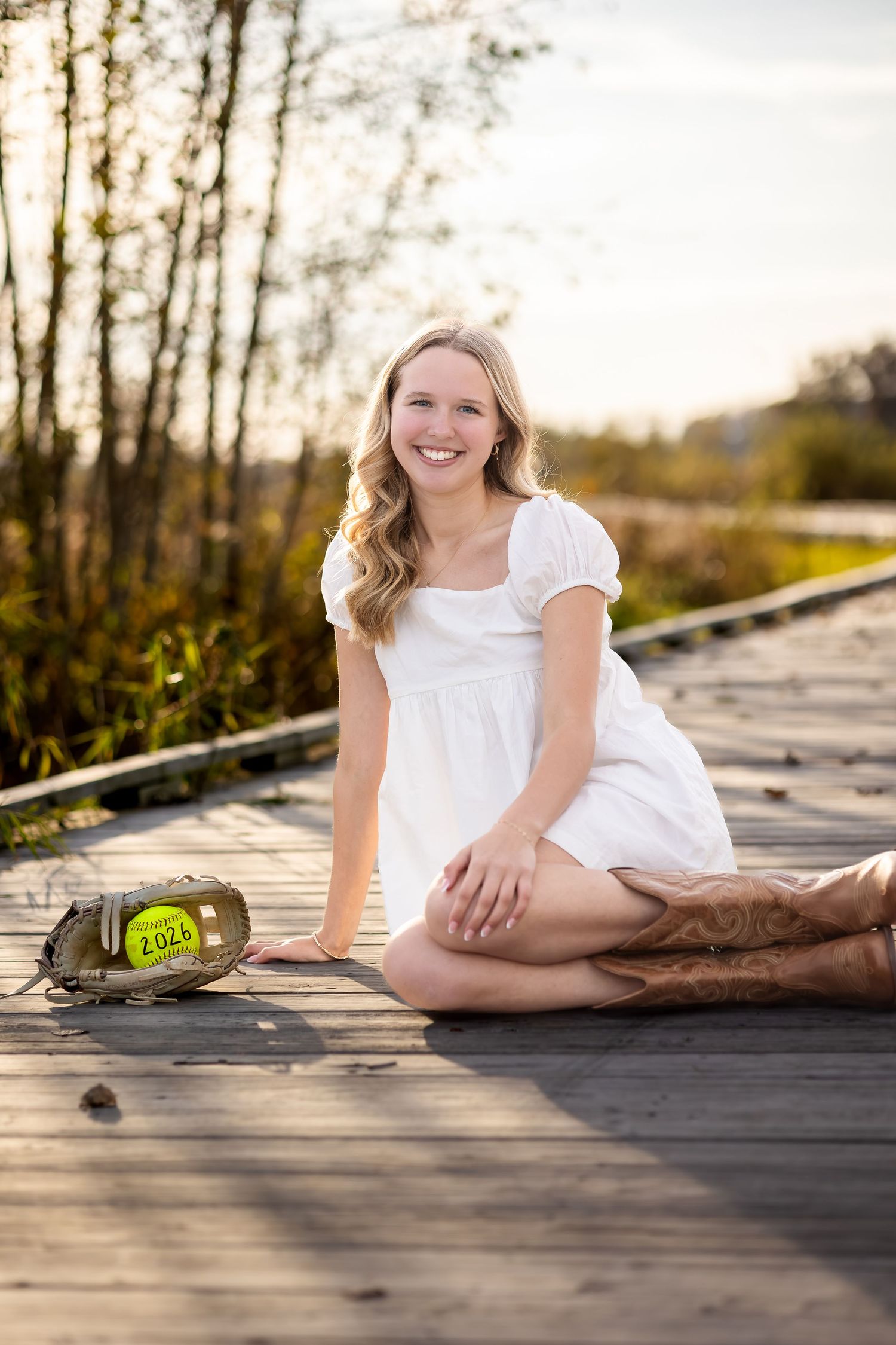 A series of casual portraits taken on a wooden deck at sunset with a football.