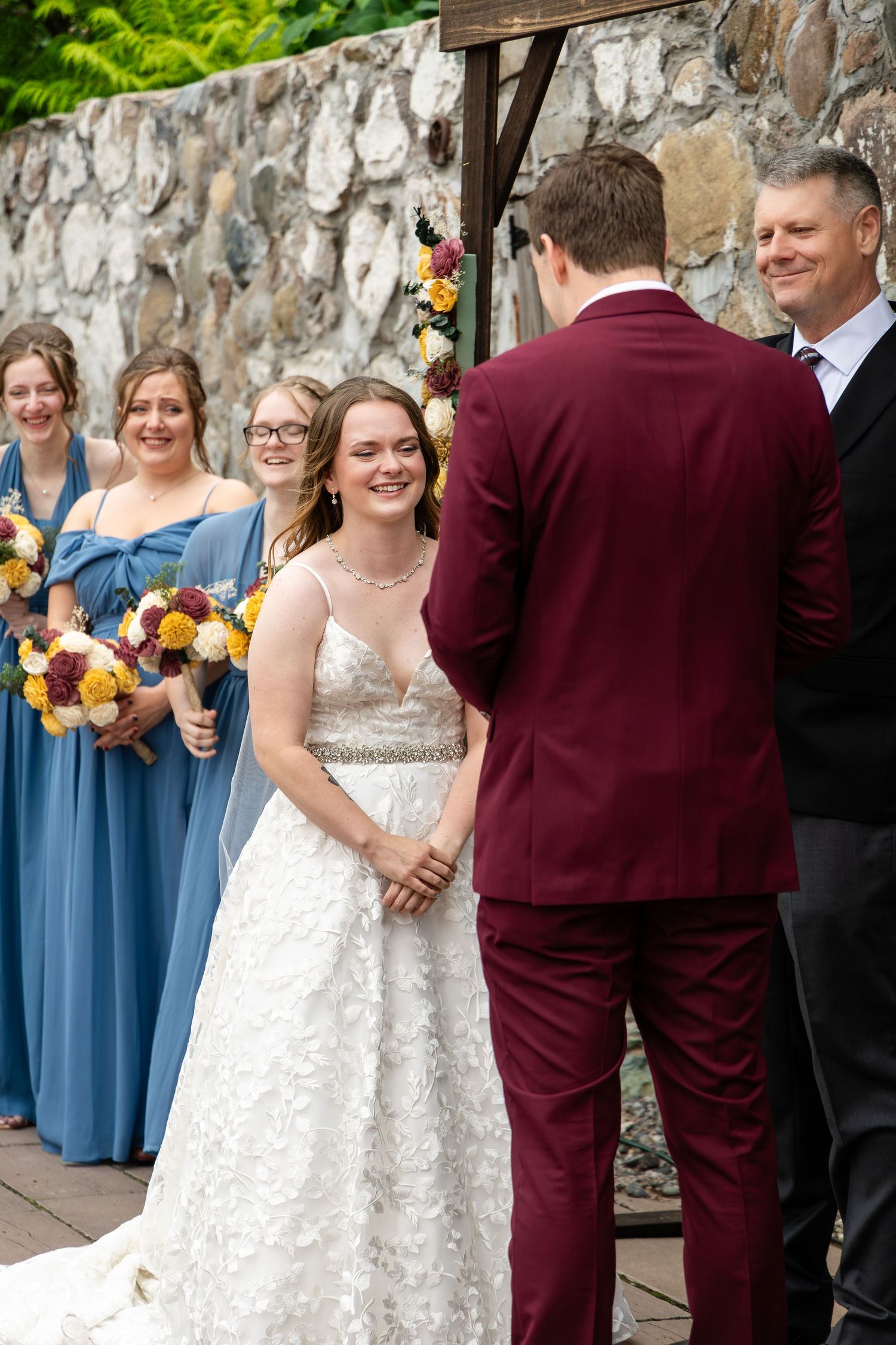 A wedding party celebration sequence with bridesmaids in blue dresses and groomsmen in burgundy suits.