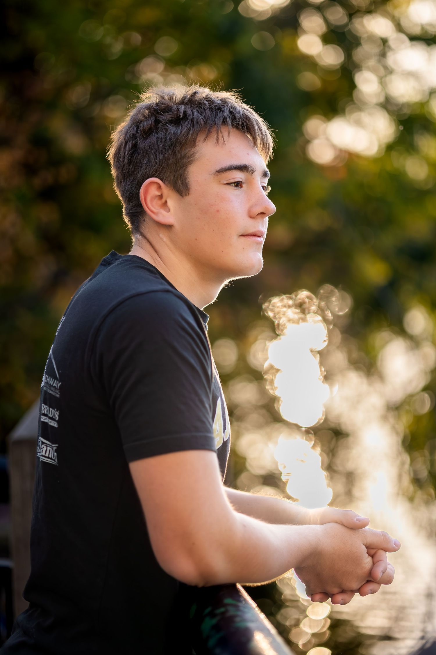 Outdoor portrait series against blurred autumn foliage with golden bokeh lighting effects.