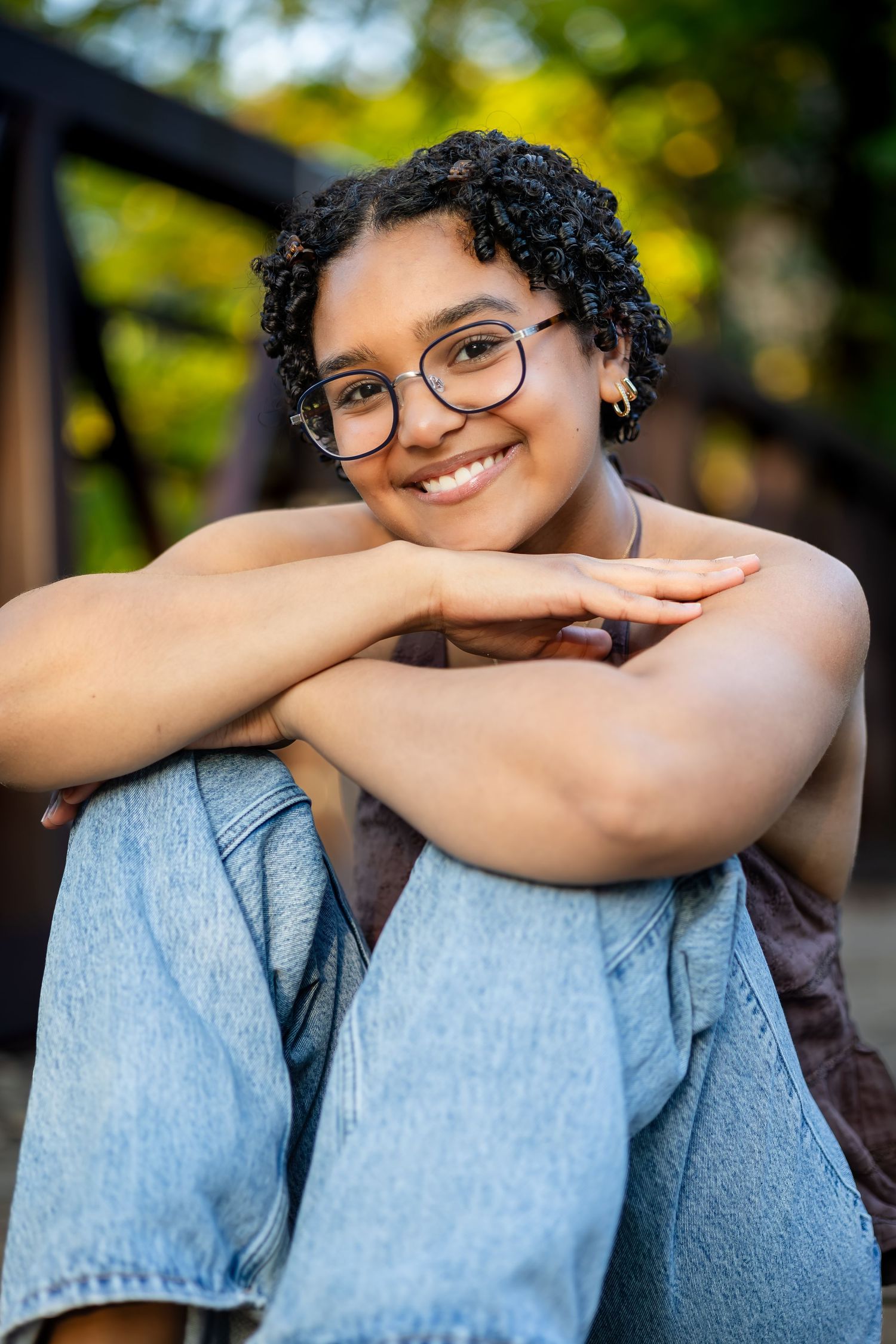 A series of outdoor portrait shots showing playful poses against a blurred natural background.