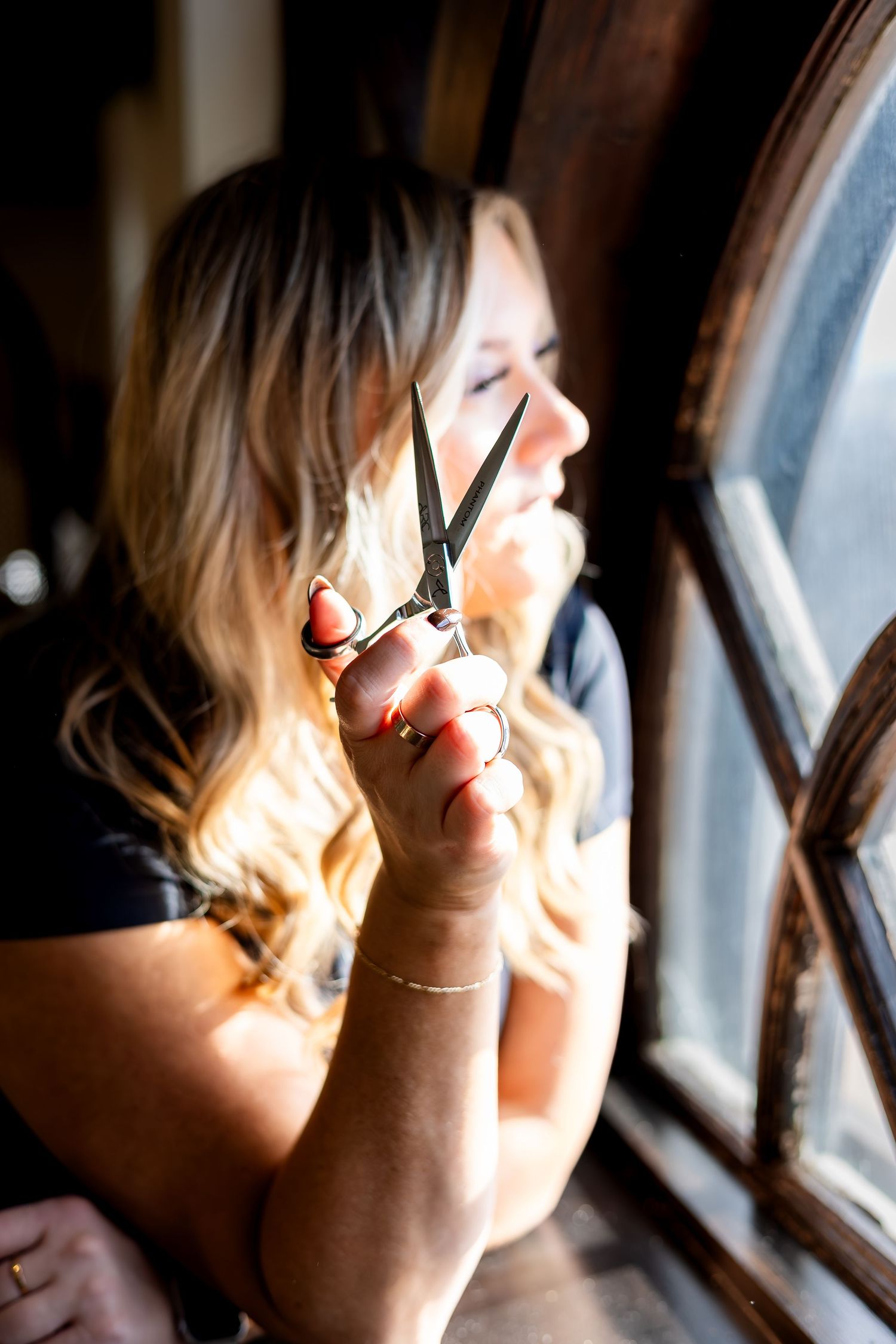 A series of soft window-lit portraits showing a person with blonde hair in a contemplative side profile pose.