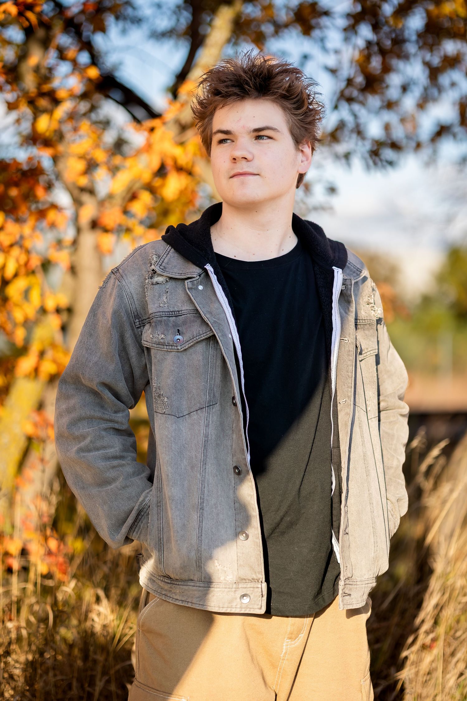 Autumn outdoor portrait series showing person in denim jacket and black shirt against golden foliage background.