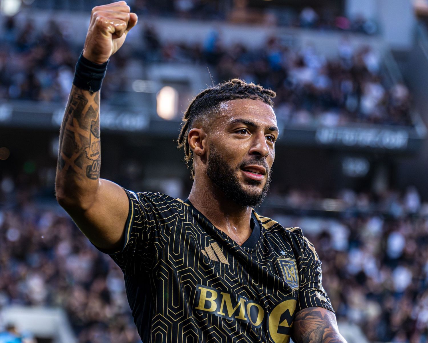LOS ANGELES, CALIFORNIA - APRIL 04: Denis Bouanga #99 of Los Angeles FC reacts after scoring a goal during the MLS match between Los Angeles