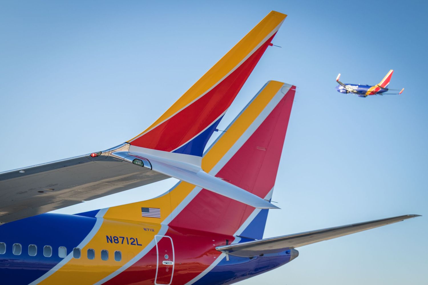 Southwest Airlines aircraft tail sections with distinctive red, blue and yellow livery.