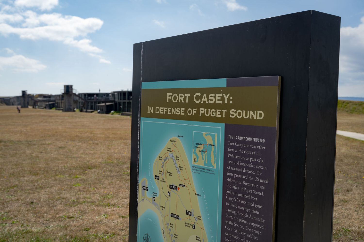 Informational sign describing Fort Casey's role in defending Puget Sound.