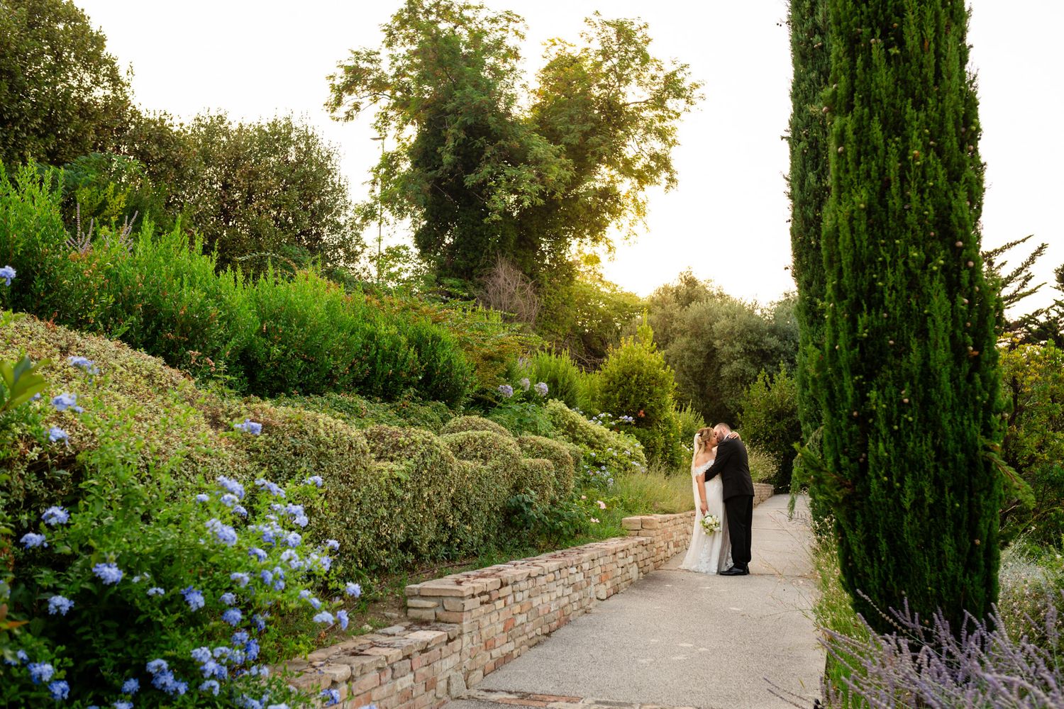 Golden light over the rolling hills of Le Marche, Italy — an exclusive setting for a refined destination wedding