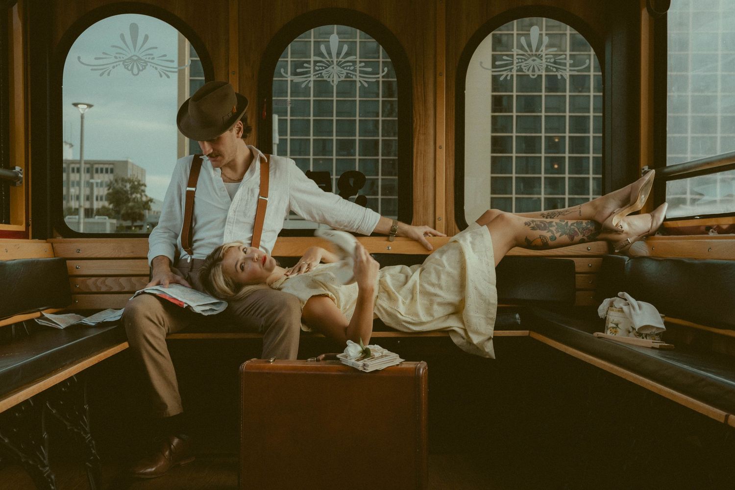 woman lays in mans lap on the jolley trolley of clearwater florida