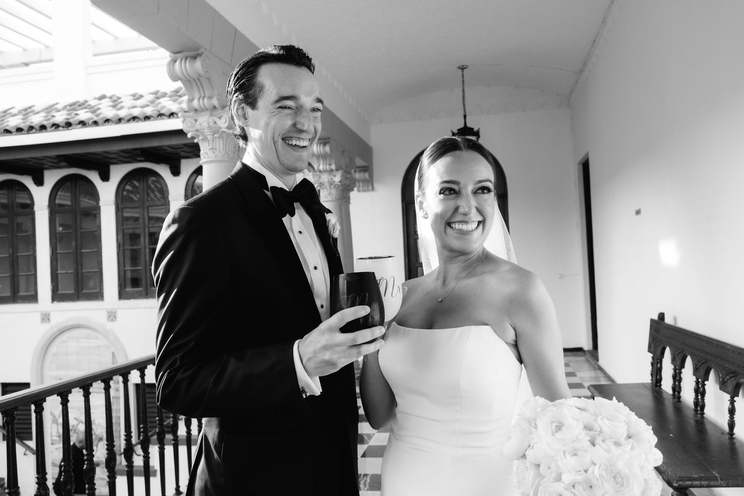 Black and white collage showing glimpses of a wedding celebration including romantic moments and elegant venue details.